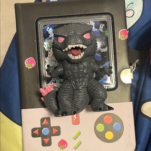 Black and Pink Monster Figurine